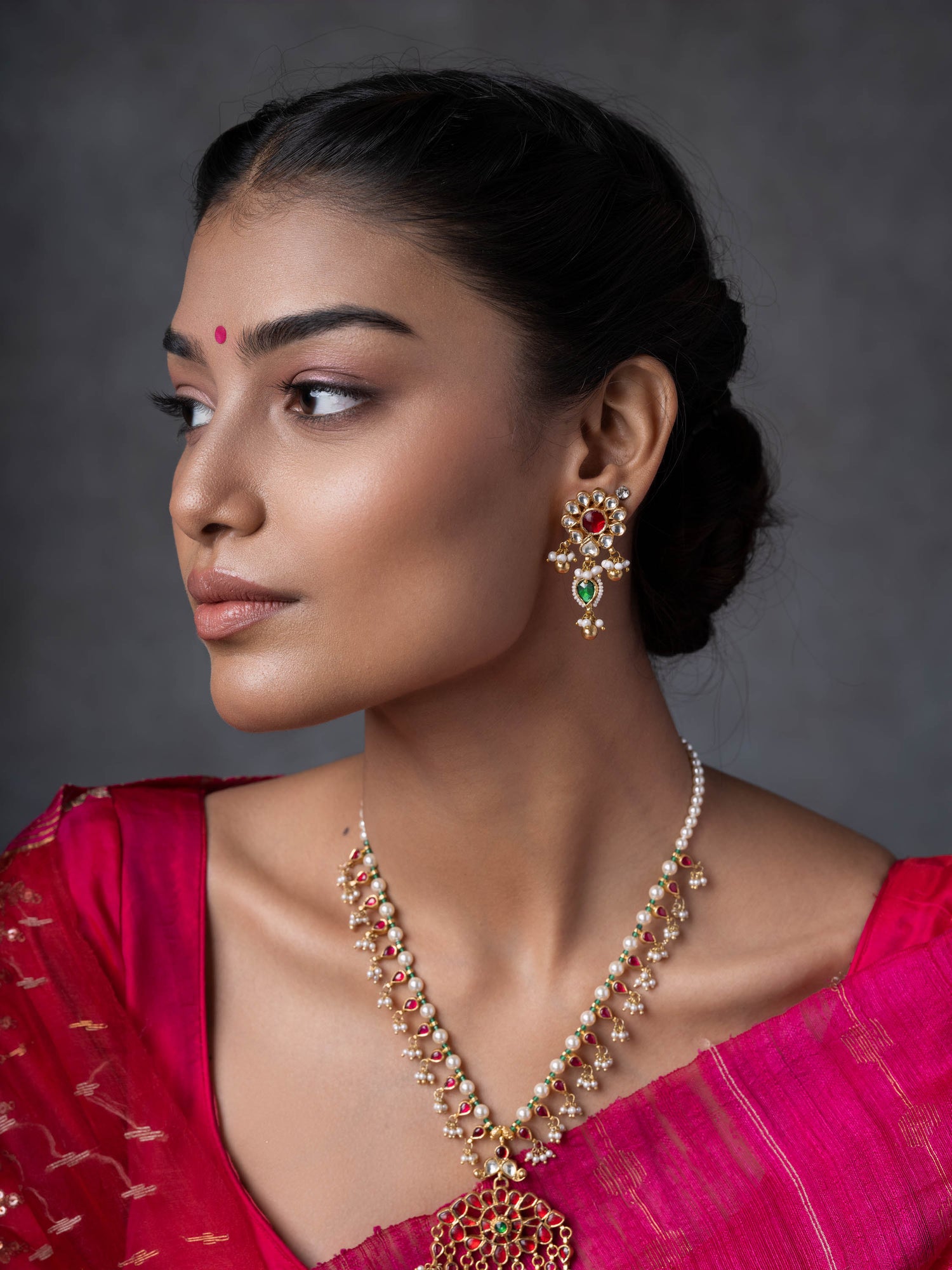 Niya,Timeless Tradition, A classic Red-Green Kundan Silver Necklace Set