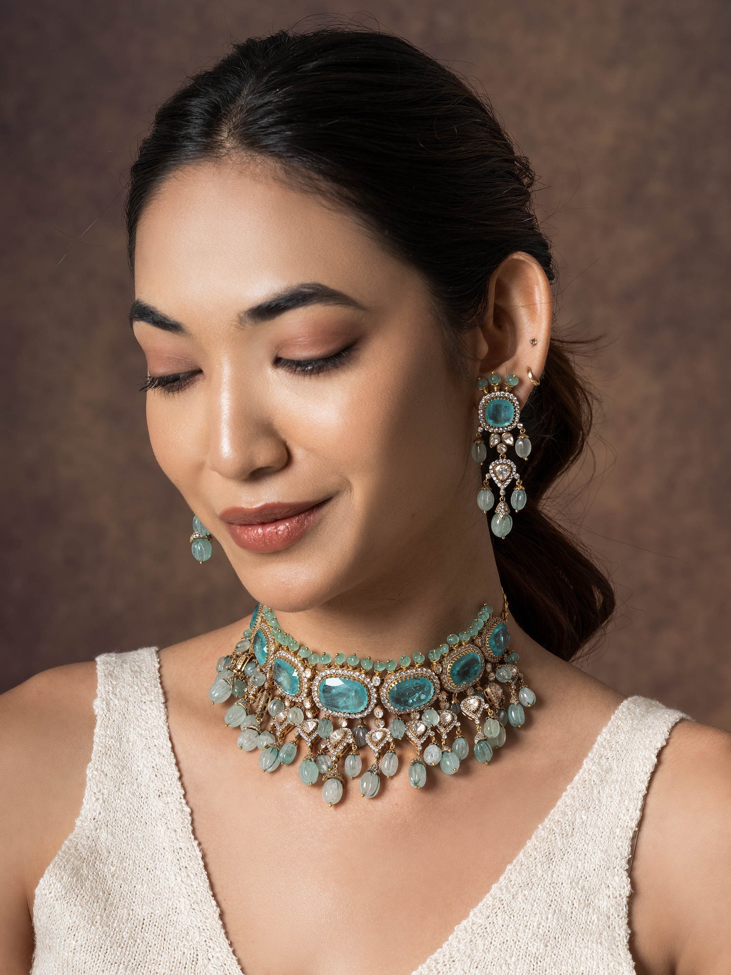 Glamoriously Glittring Aquamarine Inlaid Polki Choker Set