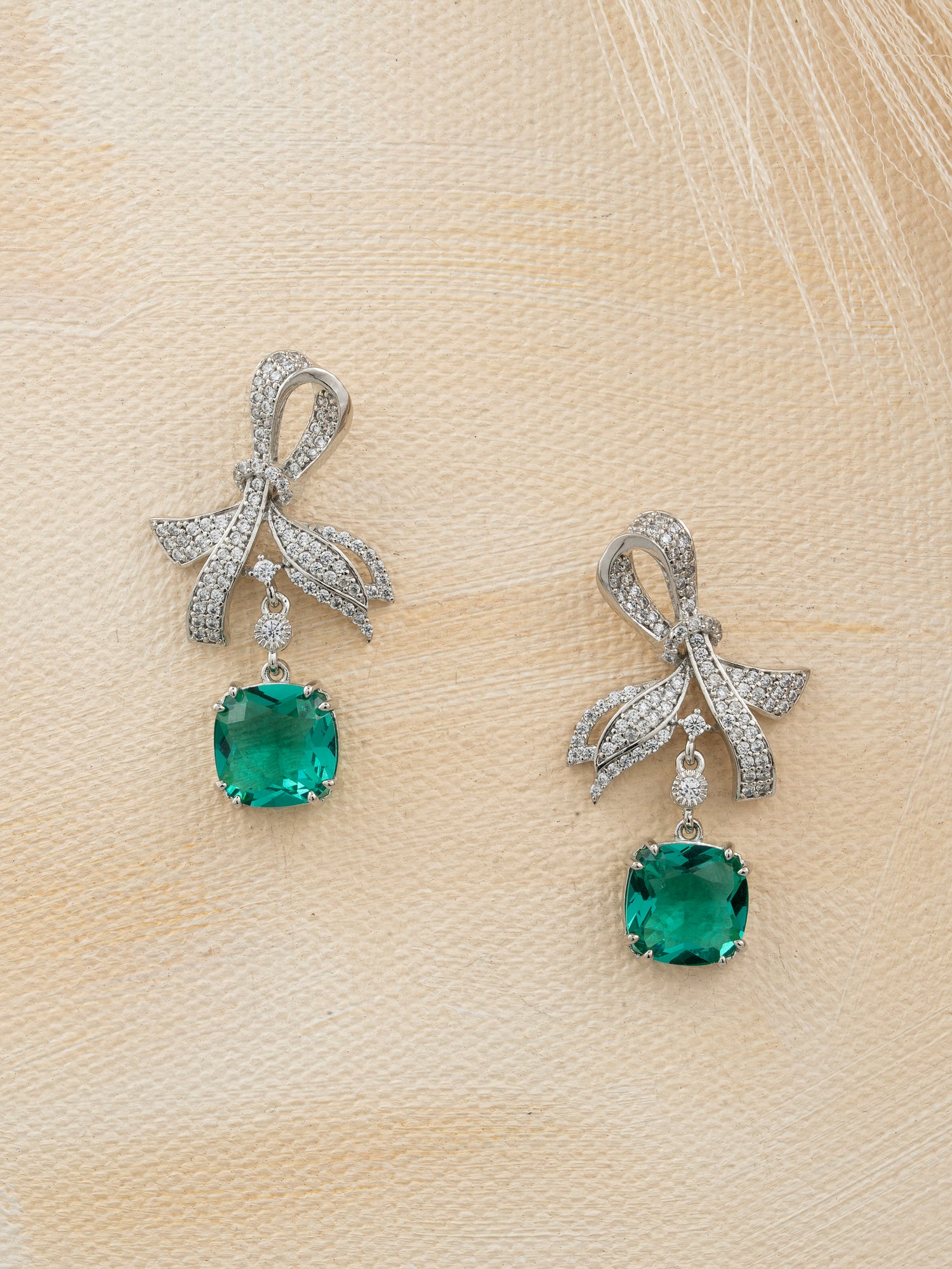 Bow Shaped Emerald Drop Earrings