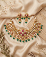 Jadtar Kundan choker necklace with emerald drops and matching earrings styled on satin – Studio Gulabi