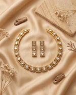 Jadtar Kundan choker necklace with long earrings styled on satin – Studio Gulabi