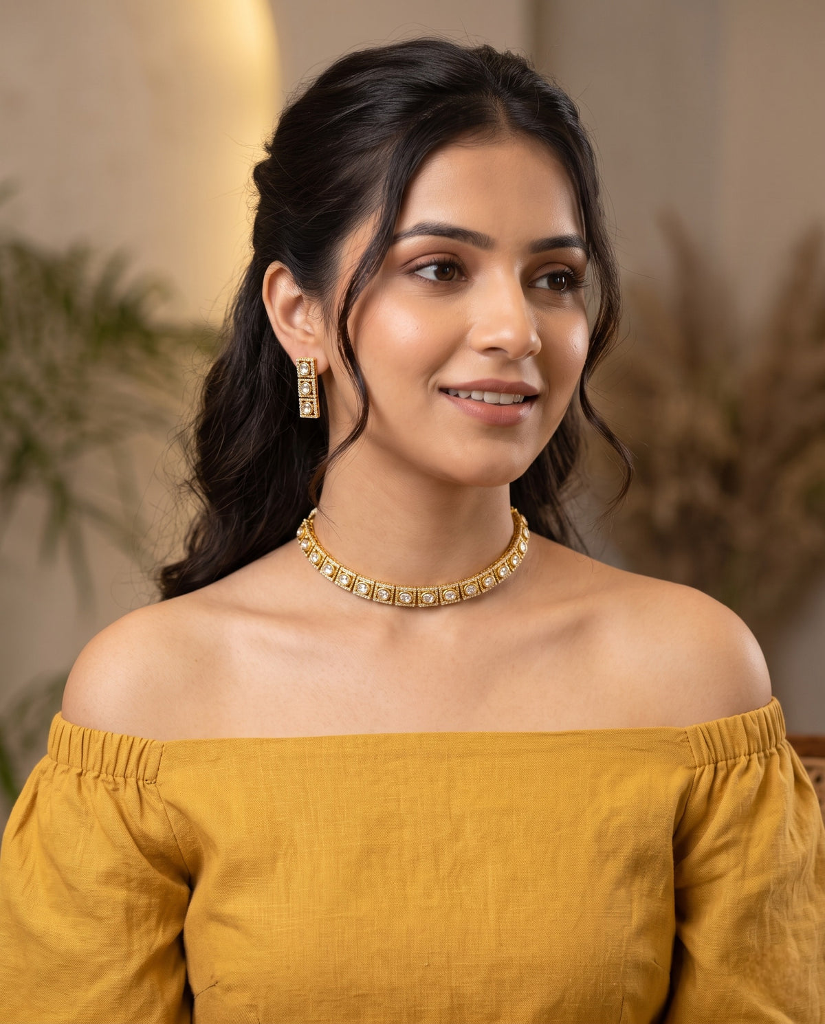 Woman wearing jadtar Kundan choker necklace with long earrings – Studio Gulabi