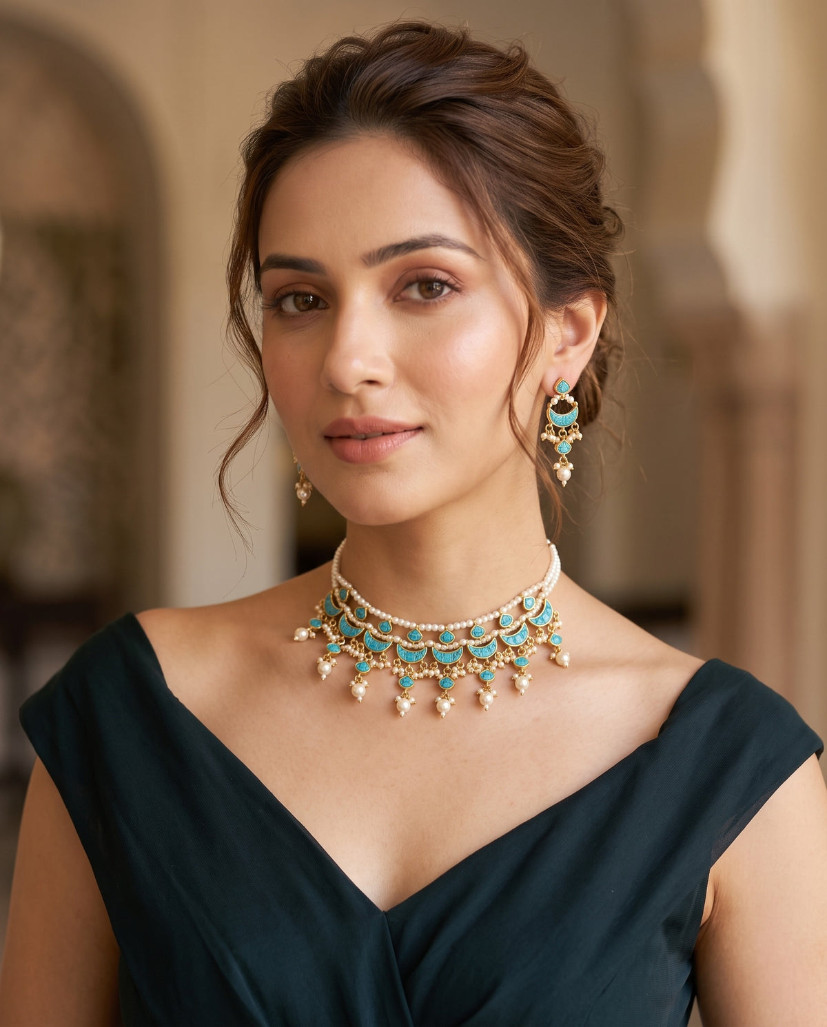 Woman wearing jadtar and moti choker necklace set with green drops and matching earrings – Studio Gulabi