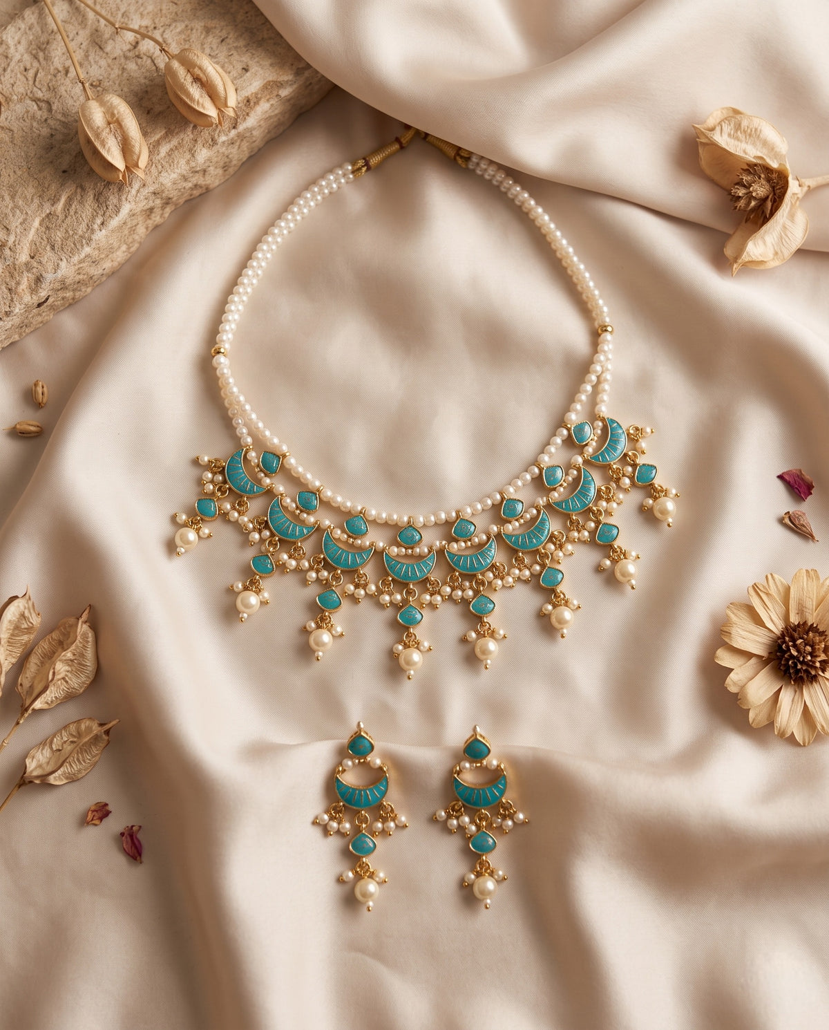 Jadtar and moti choker necklace set with green drops and matching earrings styled on satin – Studio Gulabi