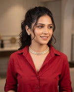 Woman wearing polki choker necklace with moti and matching stud earrings – Studio Gulabi